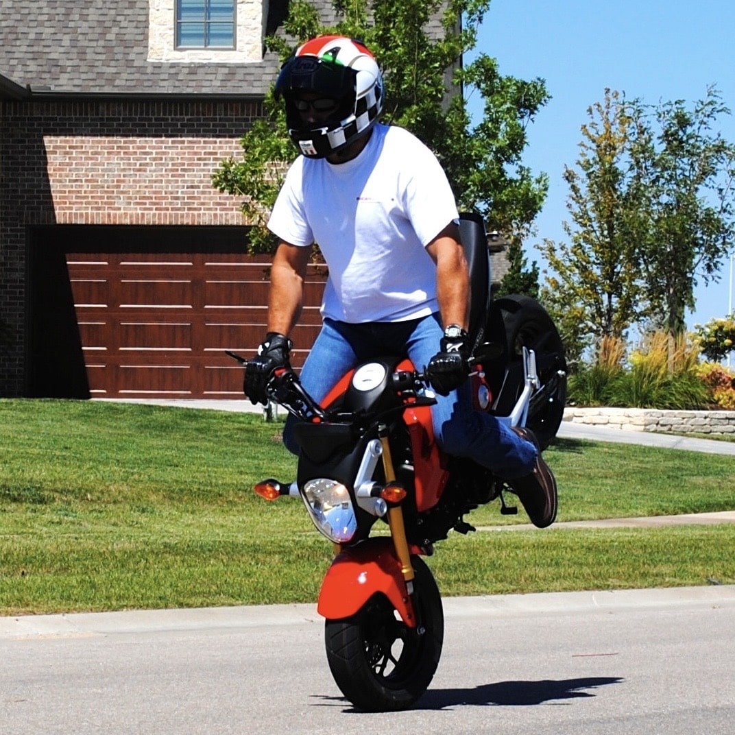 Russ Bartlett performing a stoppie
